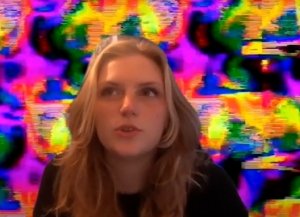 kat barnish in front of glitchy background